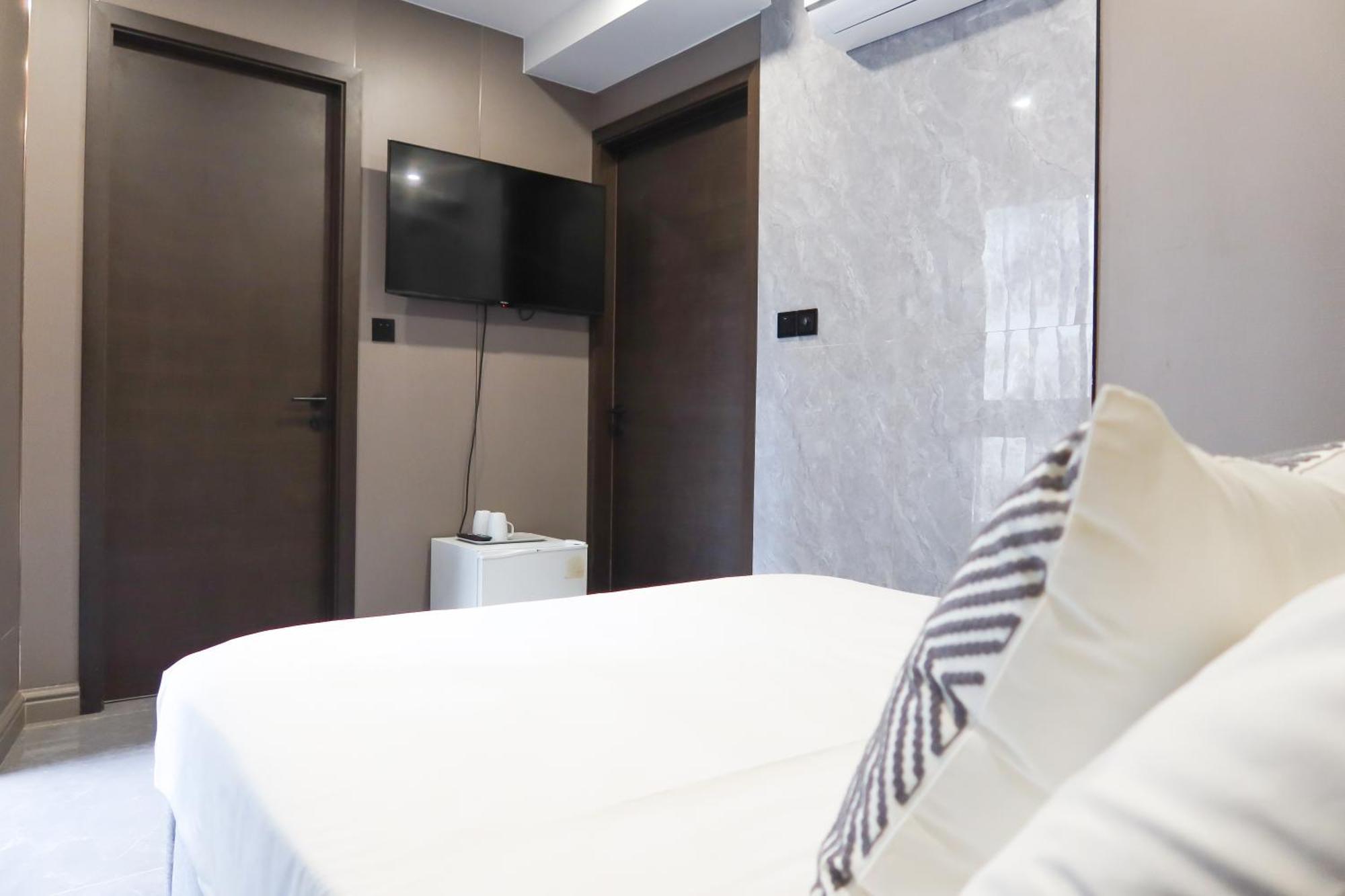 Recharge Studio Apartment & Suites Singapur Pokoj fotografie