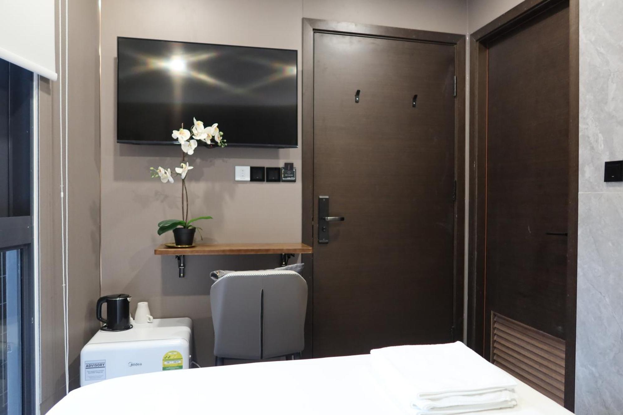 Recharge Studio Apartment & Suites Singapur Pokoj fotografie