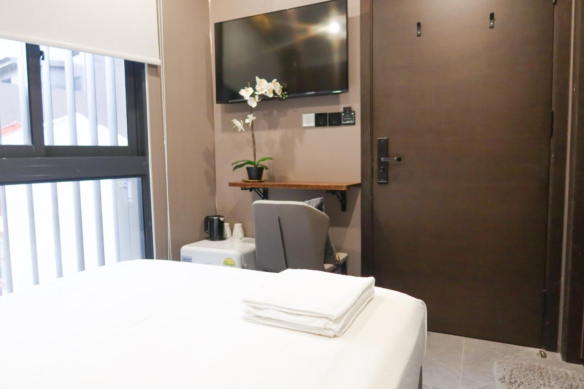 Recharge Studio Apartment & Suites Singapur Pokoj fotografie